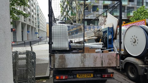 Professional waste clearance team working on a construction site